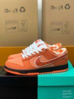 Nike UA Dunk SB Low Orange Lobster Sneakers - Image 2