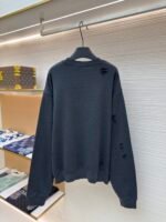 Acne Studios breaks hole to make old logo sweatshirt - Image 2
