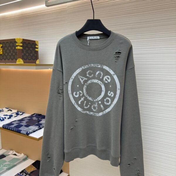 Acne Studios breaks hole to make old logo sweatshirt