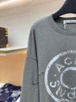 Acne Studios breaks hole to make old logo sweatshirt - Image 4