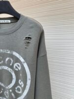 Acne Studios breaks hole to make old logo sweatshirt - Image 5