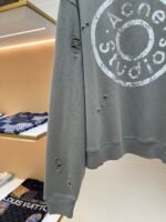 Acne Studios breaks hole to make old logo sweatshirt - Image 6