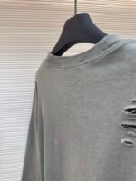 Acne Studios breaks hole to make old logo sweatshirt - Image 9