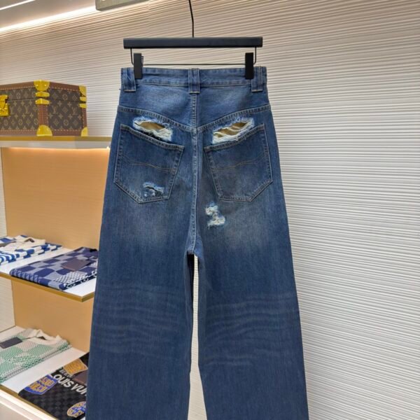 Balenciaga destroys denim wide leg pants