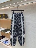 Louis Vuitton all-over print technical track pants