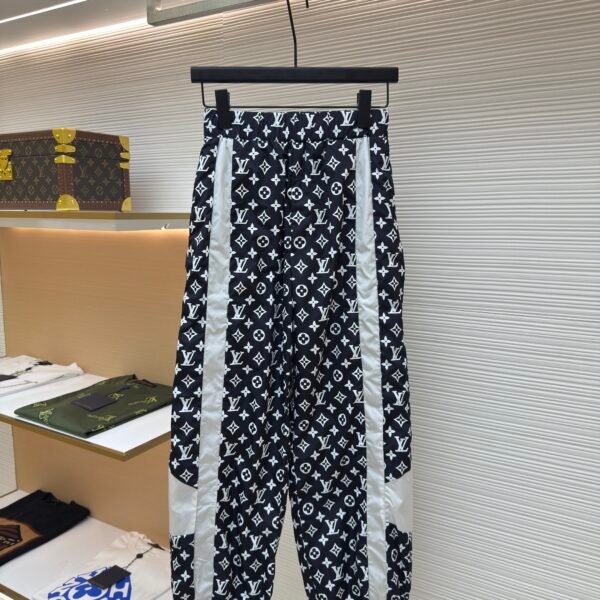 Louis Vuitton all-over print technical track pants