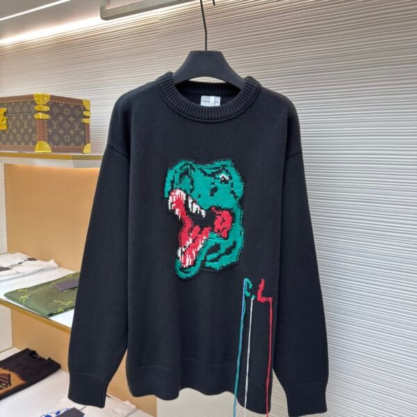 Charlie Luciano dinosaur head sweater