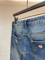 Louis Vuitton hand-sewn cherry blossom rhinestone embroidered denim shorts - Image 14