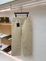 Louis Vuitton all-over embossed denim trousers