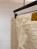 Louis Vuitton all-over embossed denim trousers - Image 7