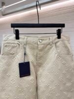 Louis Vuitton all-over embossed denim trousers - Image 8