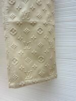 Louis Vuitton all-over embossed denim trousers - Image 18