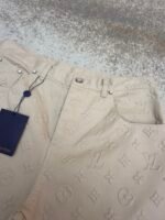 Louis Vuitton all-over embossed denim trousers - Image 16