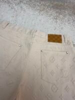 Louis Vuitton all-over embossed denim trousers - Image 15
