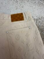 Louis Vuitton all-over embossed denim trousers - Image 13