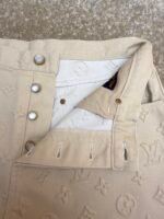 Louis Vuitton all-over embossed denim trousers - Image 11