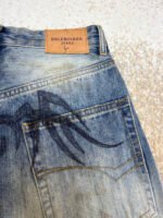 Balenciaga graffiti wide-leg jeans - Image 11