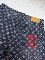 Louis Vuitton Limited Edition Distressed Jacquard Little Red Man Embroidered Jeans - Image 13