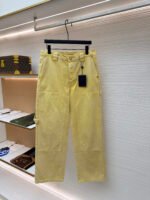 Louis Vuitton dyed embossed jeans