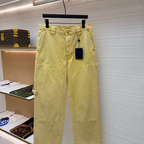 Louis Vuitton dyed embossed jeans