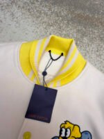 Louis Vuitton cartoon polka dot dog embroidered all-over leather-sleeved baseball jacket - Image 16