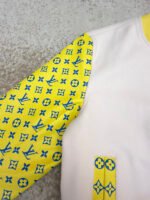 Louis Vuitton cartoon polka dot dog embroidered all-over leather-sleeved baseball jacket - Image 14